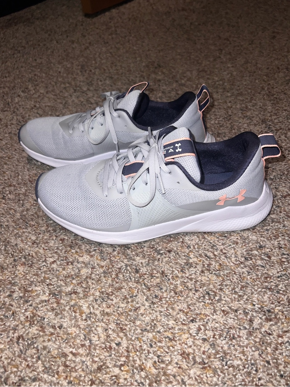 Under Armour Women’s Train Light Gray Athletic Sneakers with Pink Accents